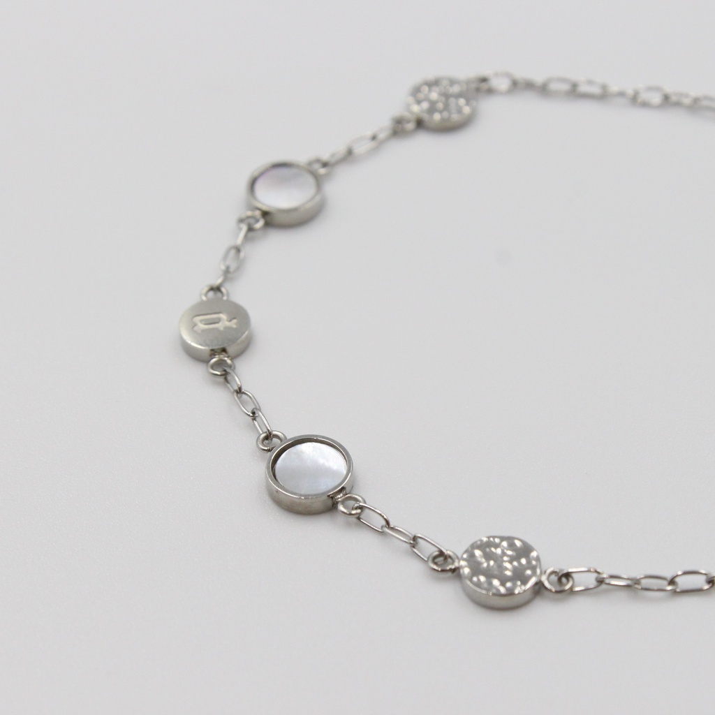 PE ORBIT POLISHED SILVER MOP MULTI-MOTIF BRACELET