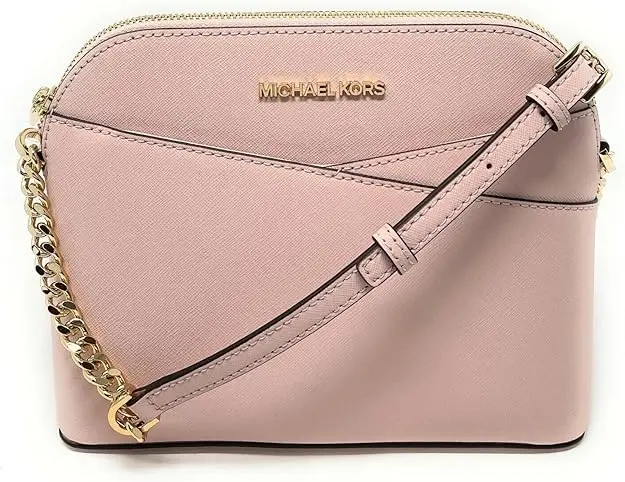 Michael Kors blush pink leather bag with an adjustable shoulder strap and chic gold-tone chain