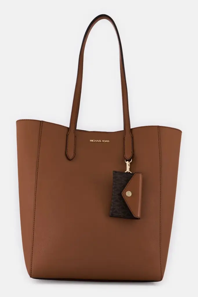 Michael Kors brown leather tote bag with a spacious design and long handles